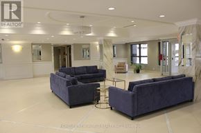 Markham (Unionville) condo for rent - A spacious living room with a large sofa set and a coffee table.