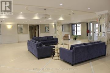 Markham (Unionville) condo for rent - A spacious living room with a large sofa set and a coffee table.
