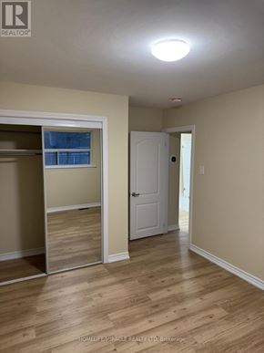 Brampton (Avondale) apartment for rent - A room with a sliding door and a white door.