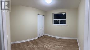 Brampton (Avondale) apartment for rent - A room with a window and a door is for sale.
