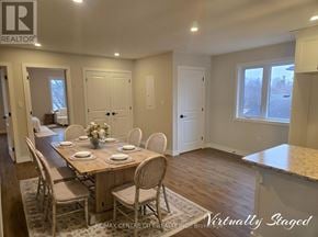 Bayham (Vienna) apartment for rent - A dining room with a table set for six.