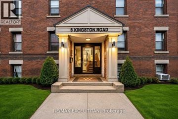 Toronto (Woodbine Corridor) condo for rent - The front entrance of a building with a sign that reads "6 Kingston Road".