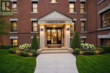 Toronto (Woodbine Corridor) condo for rent - A building with a sign that says "4 Kingston Road" in front of it.