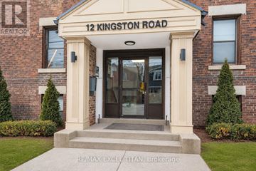 Toronto (Woodbine Corridor) condo for rent - The front of a building with the number 12 on it.