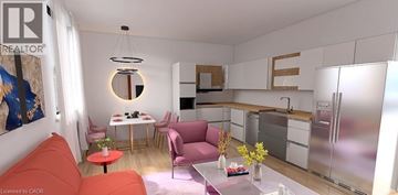 Waterloo apartment for rent - A modern kitchen with a dining area and a living room.