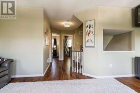 Oakville (Ro River Oaks) apartment for rent - A living room with a couch and a television.