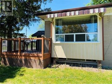 Toronto (Dorset Park) apartment for rent - A home with a deck and a covered patio area.