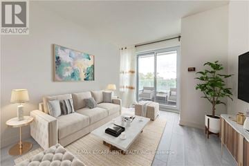 Toronto (Weston) condo for rent - A living room with a white couch, a coffee table, and a painting on the wall.