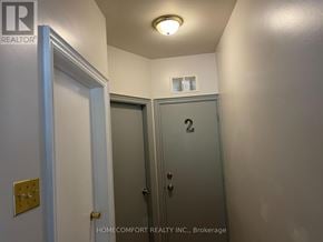 Toronto (Weston-Pellam Park) apartment for rent - A hallway with a door numbered 2.