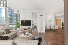 Toronto (Church-Yonge Corridor) condo for rent - A modern living room with a flat screen TV, a sofa, a coffee table, and a dining table with chairs.