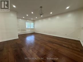 Toronto (Bendale) apartment for rent - A room with wooden flooring and a chandelier.