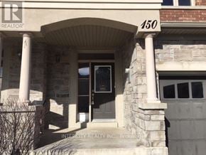 Vaughan (Patterson) townhouse for rent - A house with the number 150 on the front.