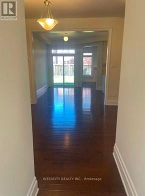 Vaughan (Patterson) townhouse for rent - A long hallway with a light at the end.