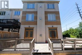 Richmond Hill (Langstaff) apartment for rent - A two-story building with a balcony and a deck in front.