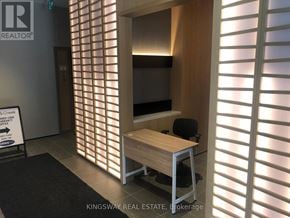 Milton (Cb Cobban) condo for rent - A real estate office with a sign that says "Kingsway Real Estate, Brokerage".