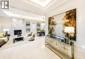 Vancouver apartment for rent - A living room with a fireplace and a painting on the wall.