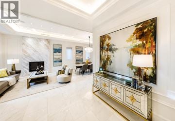 Vancouver apartment for rent - A living room with a fireplace and a painting on the wall.
