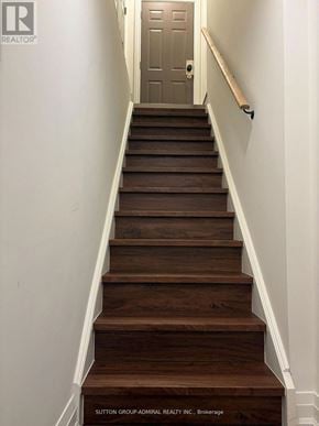 Vaughan (Maple) apartment for rent - A brown wooden staircase with white walls.