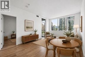 Burnaby apartment for rent - A living room with a wooden table and chairs.