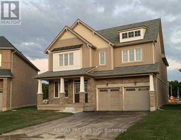 Niagara Falls (Brown) apartment for rent - A two-story house with a garage is shown in the image.