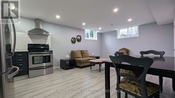 Niagara Falls (Forestview) apartment for rent - A modern kitchen with a dining table and chairs.