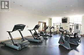 Toronto (University) condo for rent - A gym with treadmills and elliptical machines.