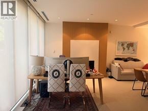 Vancouver townhouse for rent - A living room with a couch, chairs, and a rug.