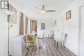 Fort Erie (Central) multi-family for rent - A well-lit room with a dining table and chairs.