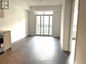 Markham (Unionville) condo for rent - A room with a sliding glass door leading to a balcony.