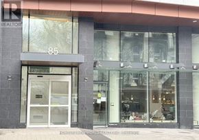Toronto (Church-Yonge Corridor) condo for rent - A realtor office with glass doors and windows.