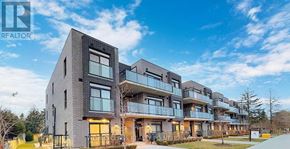 Toronto (Newtonbrook East) townhouse for rent - A modern apartment building with a realtor logo on the top left.