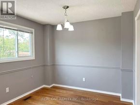 Mississauga (Meadowvale) apartment for rent - A room with a window and a wooden floor.
