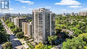 Toronto (Forest Hill South) condo for rent - A cityscape with apartment buildings and a clear sky.
