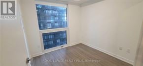 Toronto (Mount Pleasant West) condo for rent - A room with a window and a wooden floor.