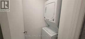 Toronto (Mount Pleasant West) condo for rent - A white toilet with a white tank in a white bathroom.