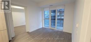 Toronto (Mount Pleasant West) condo for rent - A room with a sliding glass door leading to a balcony.