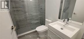 Toronto (Mount Pleasant West) condo for rent - A white sink in a bathroom with a glass shower door.