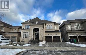 Brampton (Toronto Gore Rural Estate) apartment for rent - A large, two-story house with a garage is for sale.