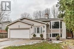 Markham (Unionville) apartment for rent - A house with a white garage door and a brown roof.