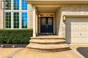Burlington (Rose) apartment for rent - A house with a black front door and a white garage door.