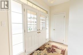Brampton (Credit Valley) apartment for rent - A hallway with a rug and a door.