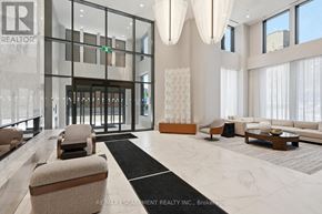 Hamilton (Durand) condo for rent - A spacious lobby with a marble floor and modern furniture.