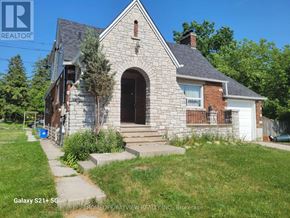 Markham (Old Markham Village) apartment for rent - A house with a stone facade and a white door is for sale.
