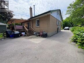 Halton Hills (Georgetown) apartment for rent - A house with a driveway in front of it.