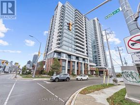Kitchener condo for rent - A modern building with a glass facade is located on King St.