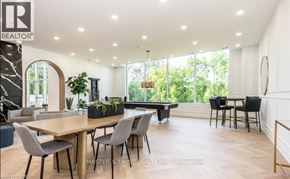 Guelph (St. Patrick's Ward) condo for rent - A dining room with a table and chairs.