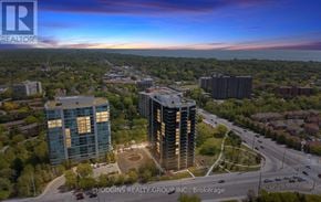 Mississauga (Clarkson) condo for rent - A brochure for Hodgins Realty Group Inc. is displayed.