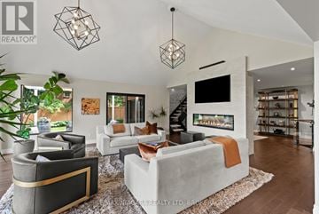 Niagara-On-The-Lake (Queenston) apartment for rent - A living room with a grey couch and a white sofa.
