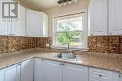 Thorold (Thorold Downtown) apartment for rent - A kitchen with a sink and cabinets.