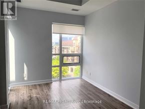 Toronto (Bayview Village) condo for rent - A room with a sliding glass door leading to a balcony.